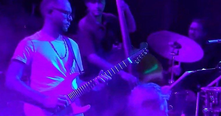 Stage broadcast in purple light